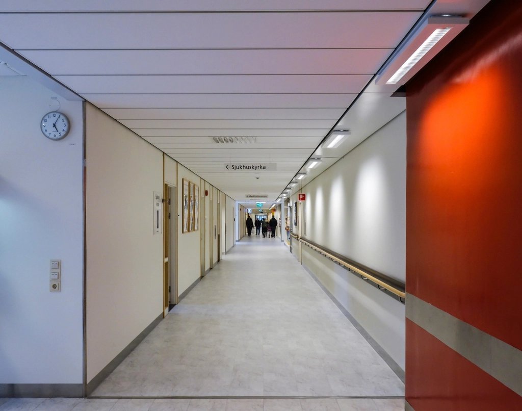 A modern, brightly lit hospital corridor