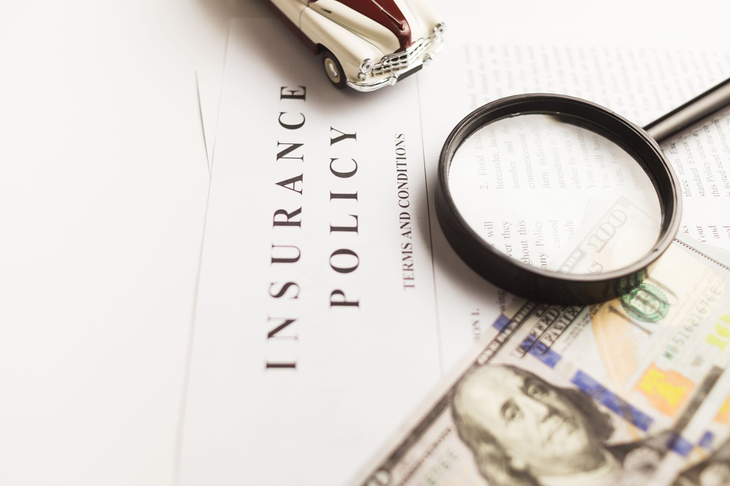 Auto insurance policy document close-up